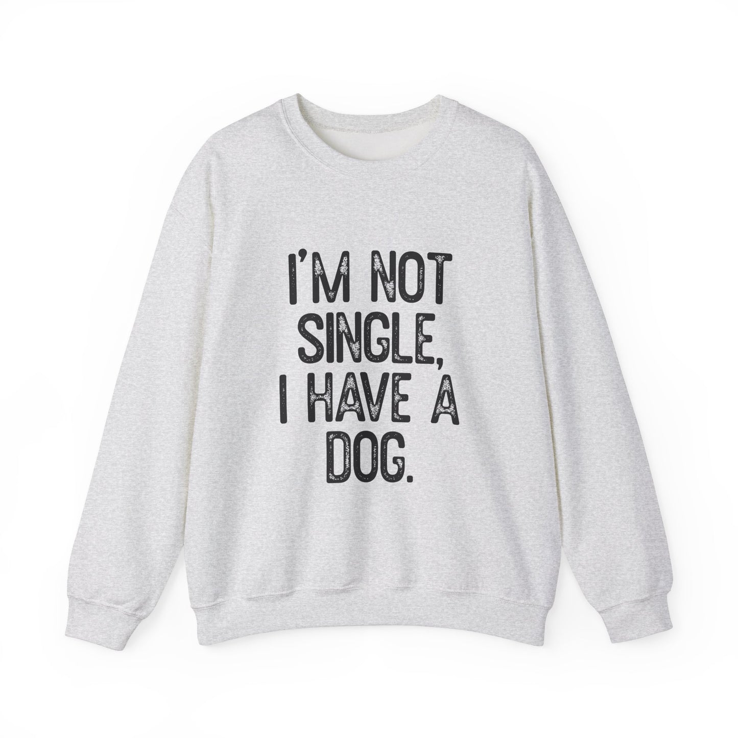 The Printify Funny Dog Lover Crewneck Sweatshirt features a cozy, light gray design with bold black text stating Im Not Single, I Have A Dog, perfect for dog lovers who enjoy humor in their wardrobe.