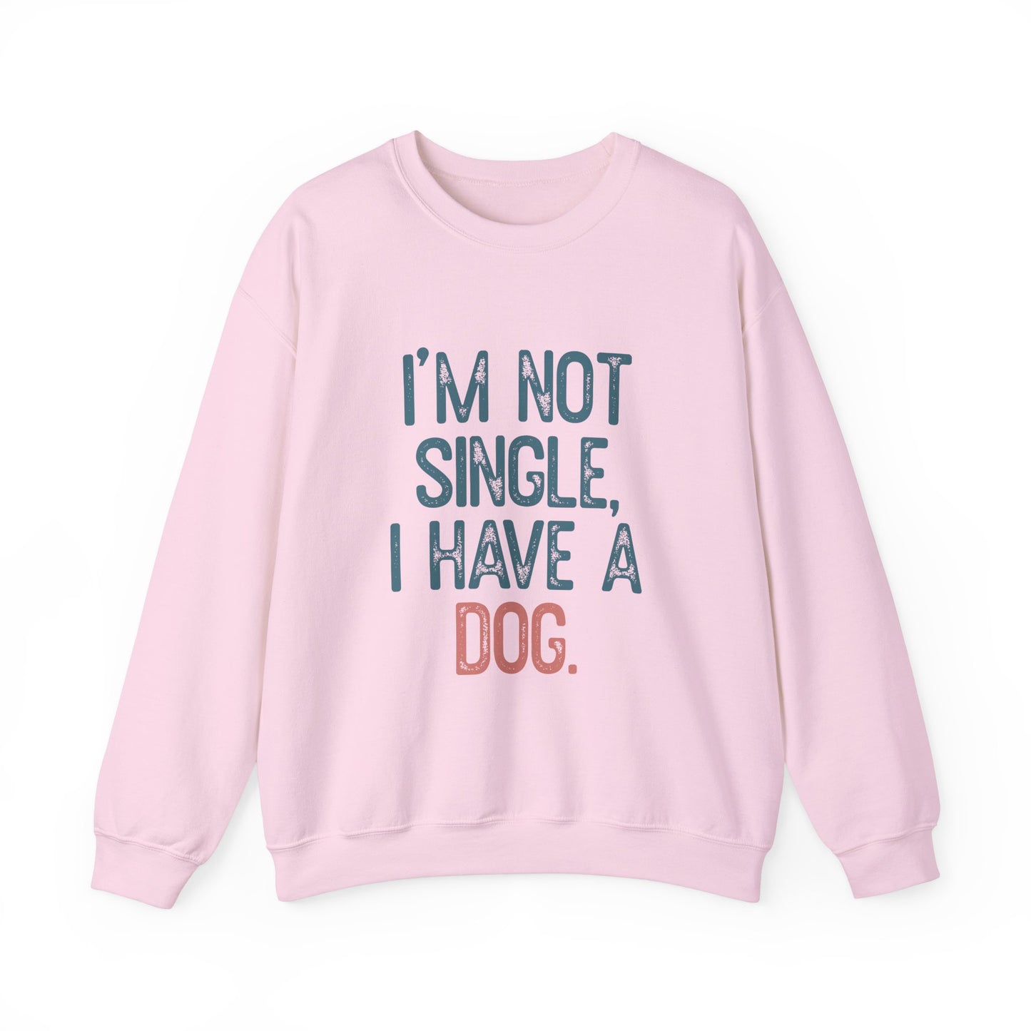 The Printify Dog Lover Crewneck Sweatshirt - I’m Not Single features playful blue and pink text on a light pink unisex sweatshirt, making it an ideal gift for dog owners.