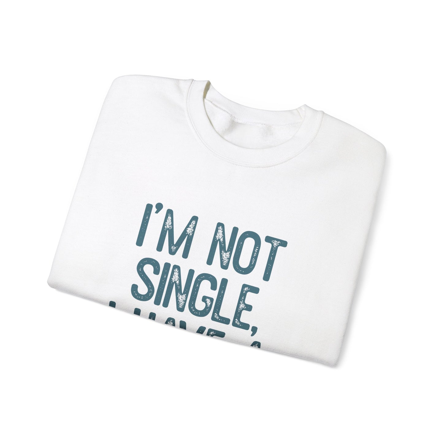 A folded unisex crewneck sweatshirt from Printify features blue text, I’M NOT SINGLE, on a white background. Perfect for dog lovers, its an ideal pet owner gift that showcases affection in style.
