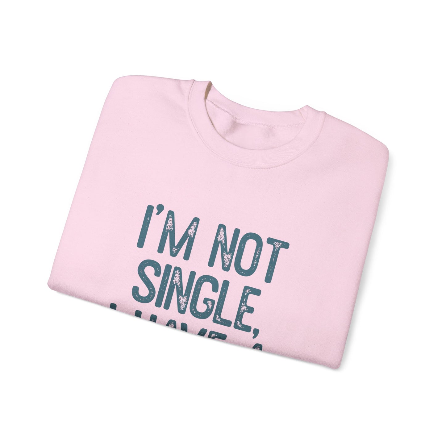 The Banks + Cove Dog Lover Crewneck Sweatshirt - I’m Not Single is a unisex pink shirt featuring IM NOT SINGLE, I HAVE A in bold, weathered black letters. Its an ideal gift for pet owners or dog lovers to proudly display their special bond.