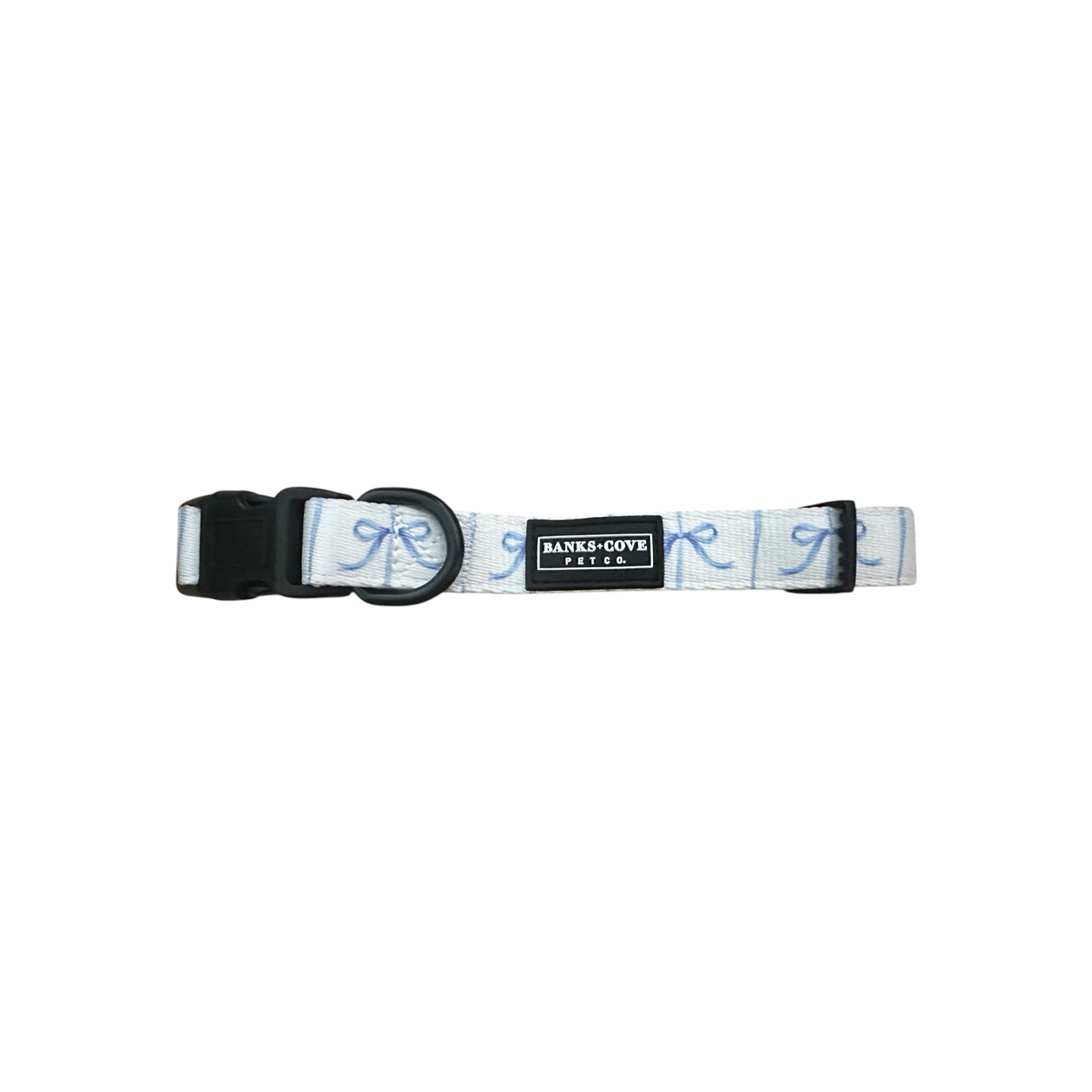 Elevate your pups style with the Distinguished Gentlepup Dog Collar, featuring a white and light blue pattern, sturdy plastic buckle, and metal ring. The brand label Banks + Cove adds sophistication to this elegant collar.
