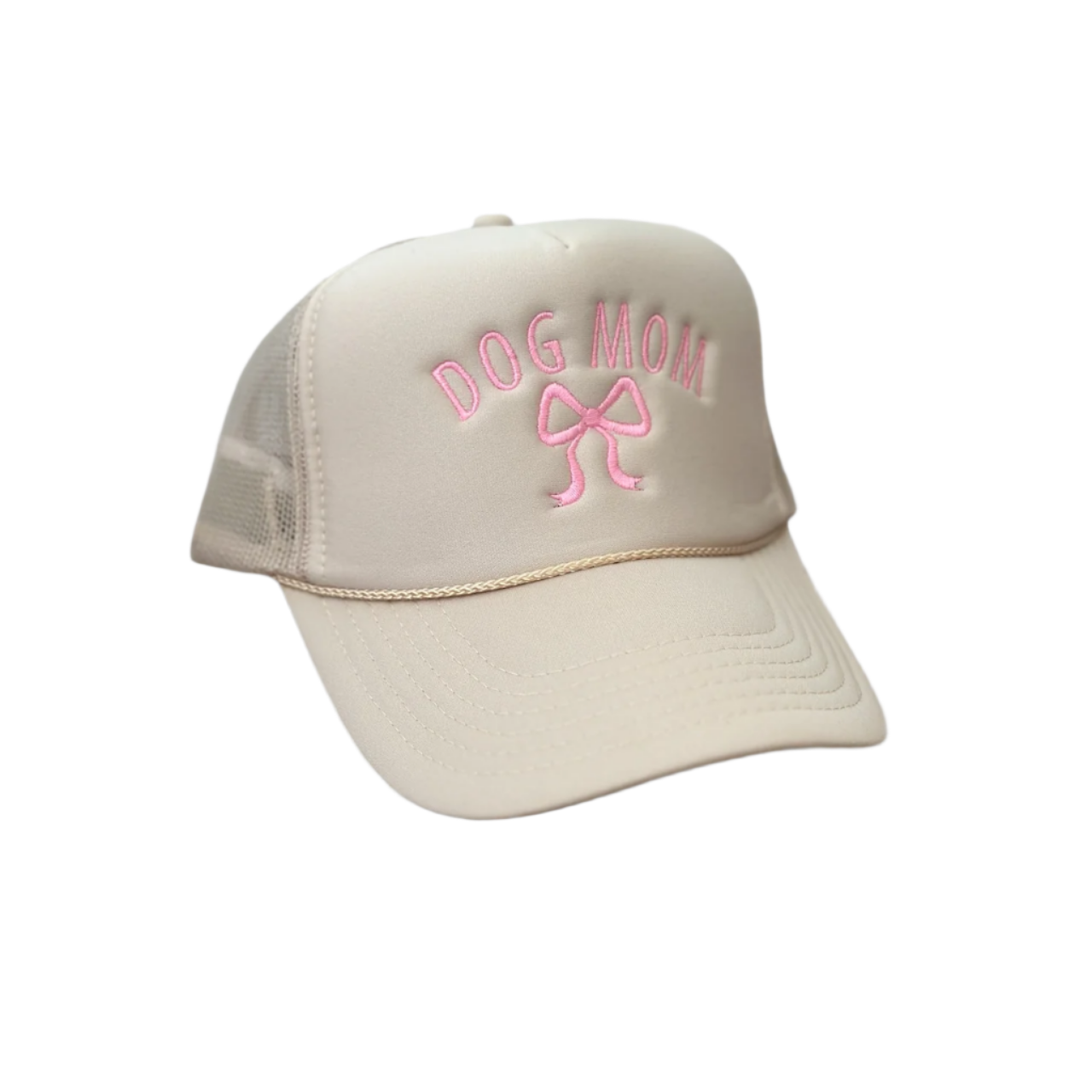 The Banks + Cove Dog Mom Bow Trucker Hat is a beige hat with a mesh back, ideal for dog lovers. It features Dog Mom embroidered in pink above a delightful pink bow on the front panel.