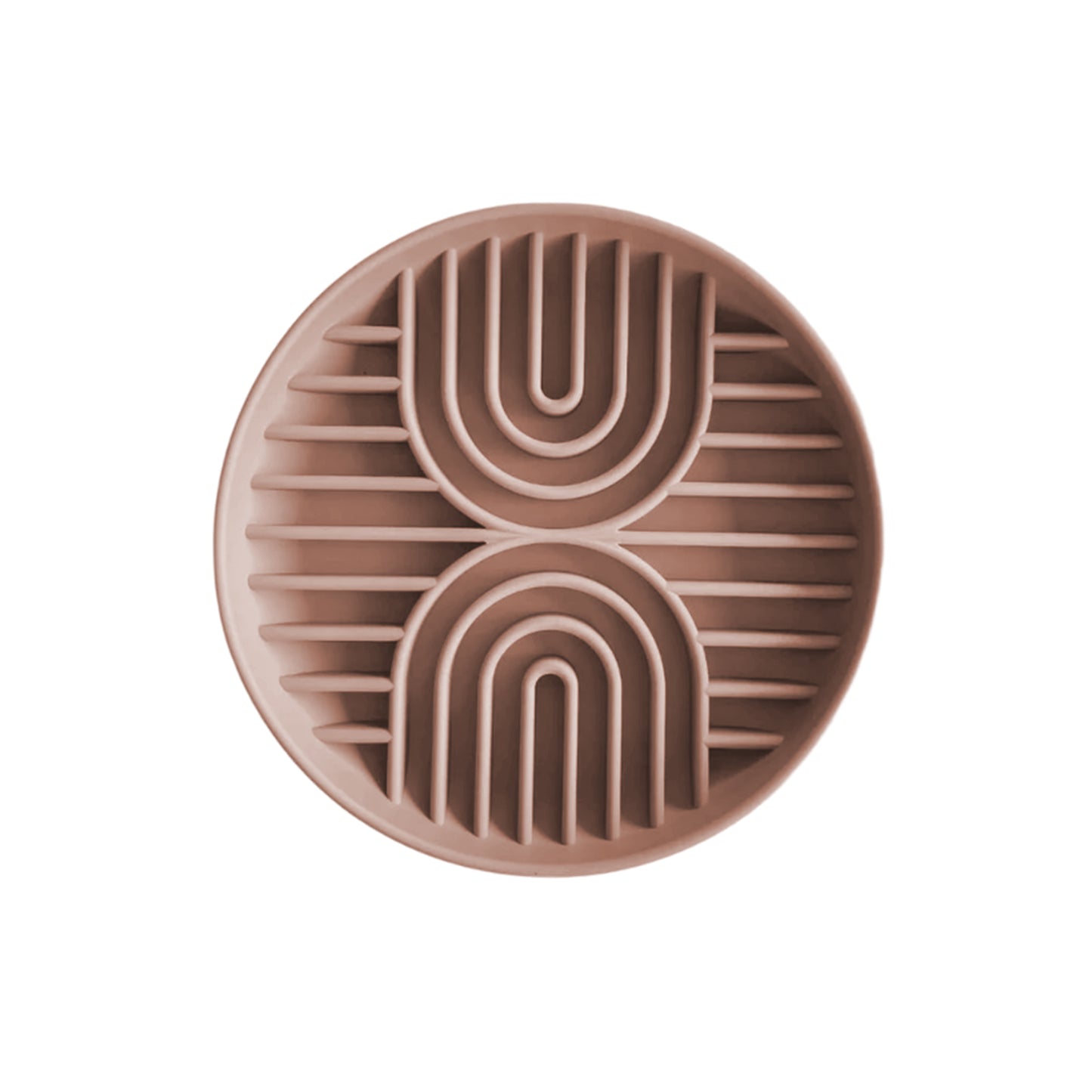 The round, brown rubber soap dish with parallel lines and two symmetrical arches resembles Banks + Coves Double Rainbow Slow Feeder. With its minimalist design, it exudes modern luxury against a plain white background.