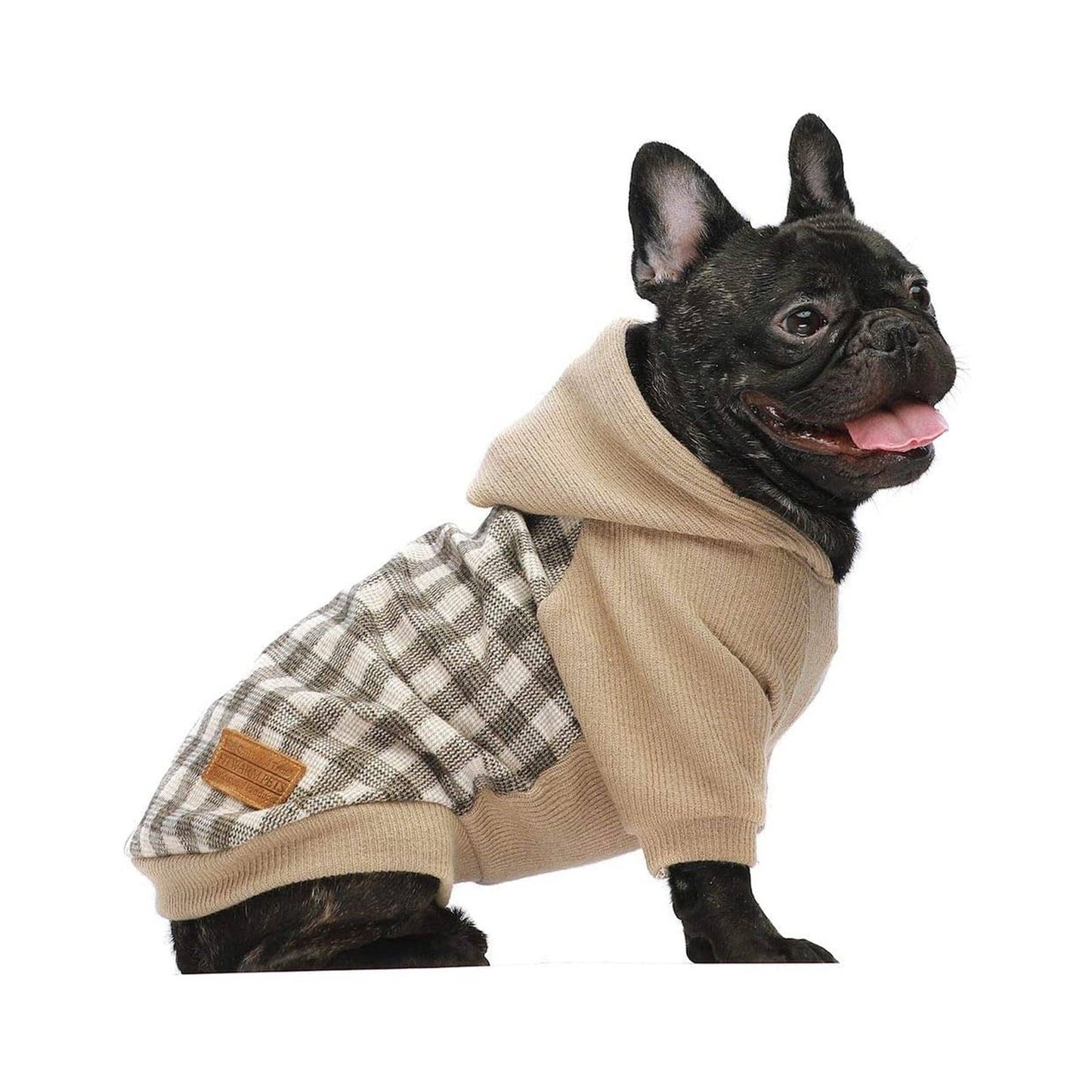 A joyful black French Bulldog, tongue out, sits facing right on a white background. It wears Fitwarms beige Plaid Sweater Hoodie, designed with elastic ribbing and a hidden leash attachment for style and practicality.