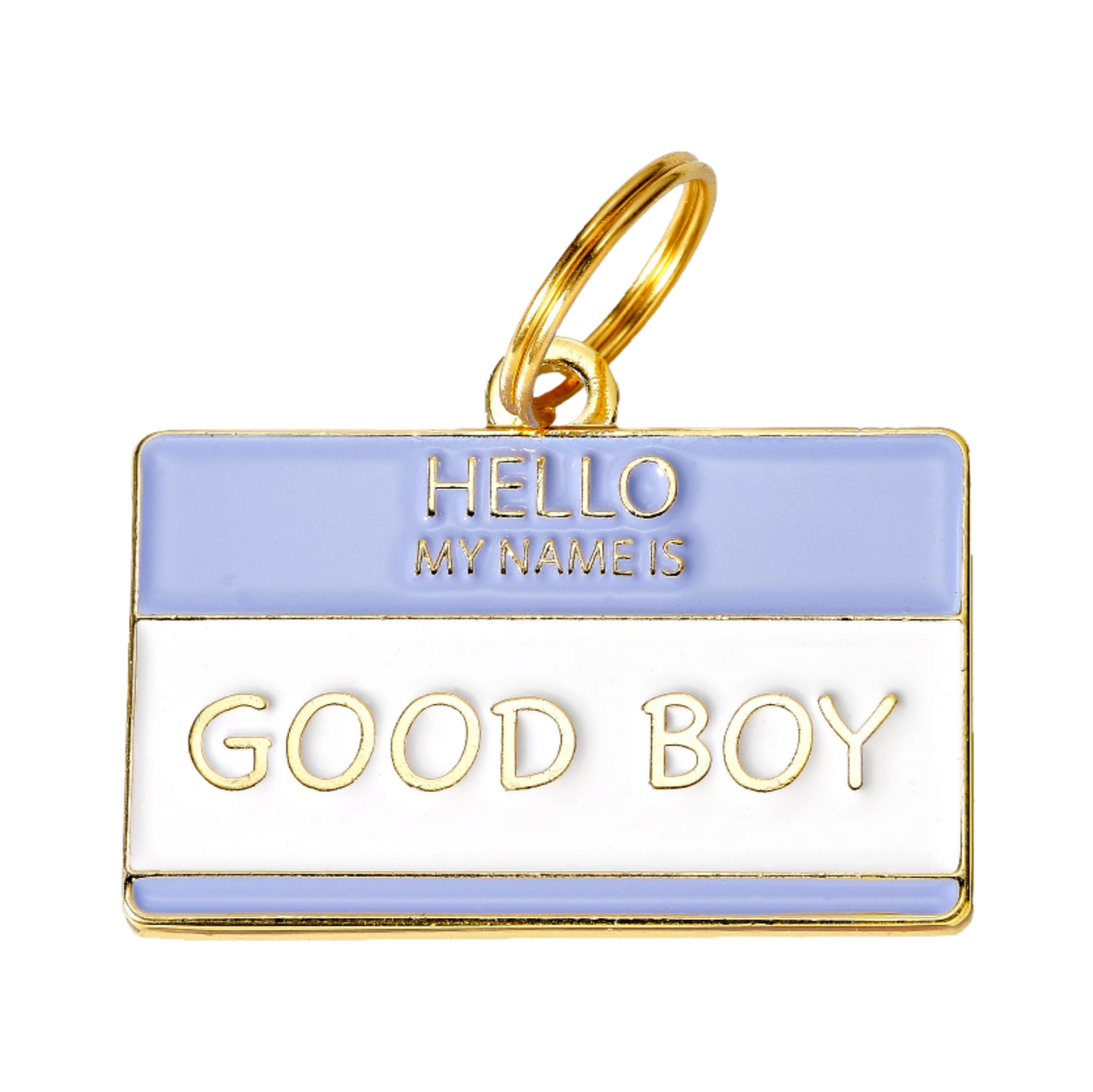 The Good Boy Collar Charm by Two Tails Pet Company is a brass pet tag shaped like a name badge in gold and lavender, featuring HELLO MY NAME IS with GOOD BOY in bold. It includes a gold ring for easy attachment, making it a charming accessory for your dogs collar.