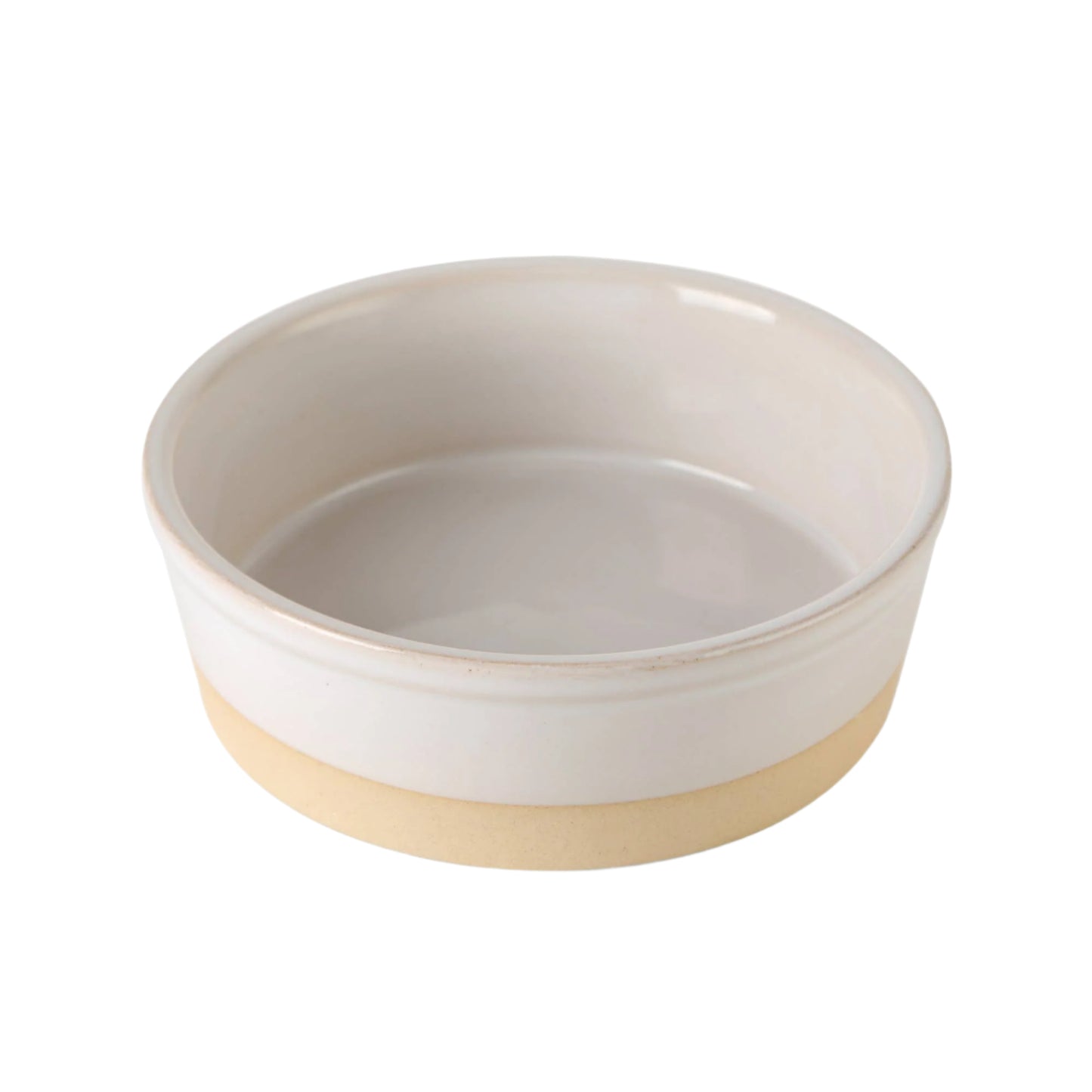 The Nordic Cream Pet Bowl by Park Life Designs is a round, shallow ceramic bowl featuring a smooth, glossy white interior and a matte light beige exterior. Its elegant and modern design makes it ideal for serving or baking.