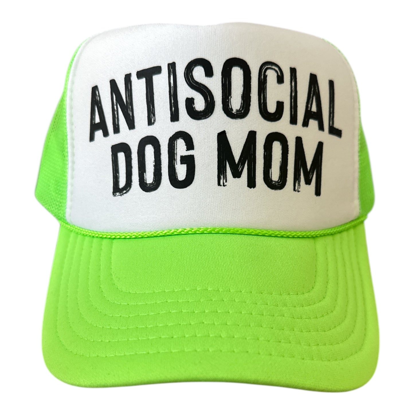 The Banks + Cove Antisocial Dog Mom Trucker Hat is a neon green and white cap with ANTISOCIAL DOG MOM in bold black letters—perfect for proud dog moms who love showing off their style.