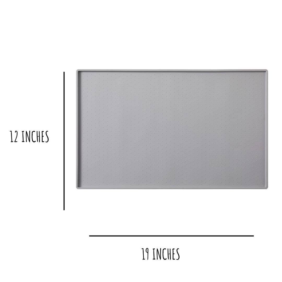 A 12x19 rectangular gray Silicone Mess Free Pet Placemat by Park Life Designs is shown on a white background, with black text and lines indicating its dimensions.