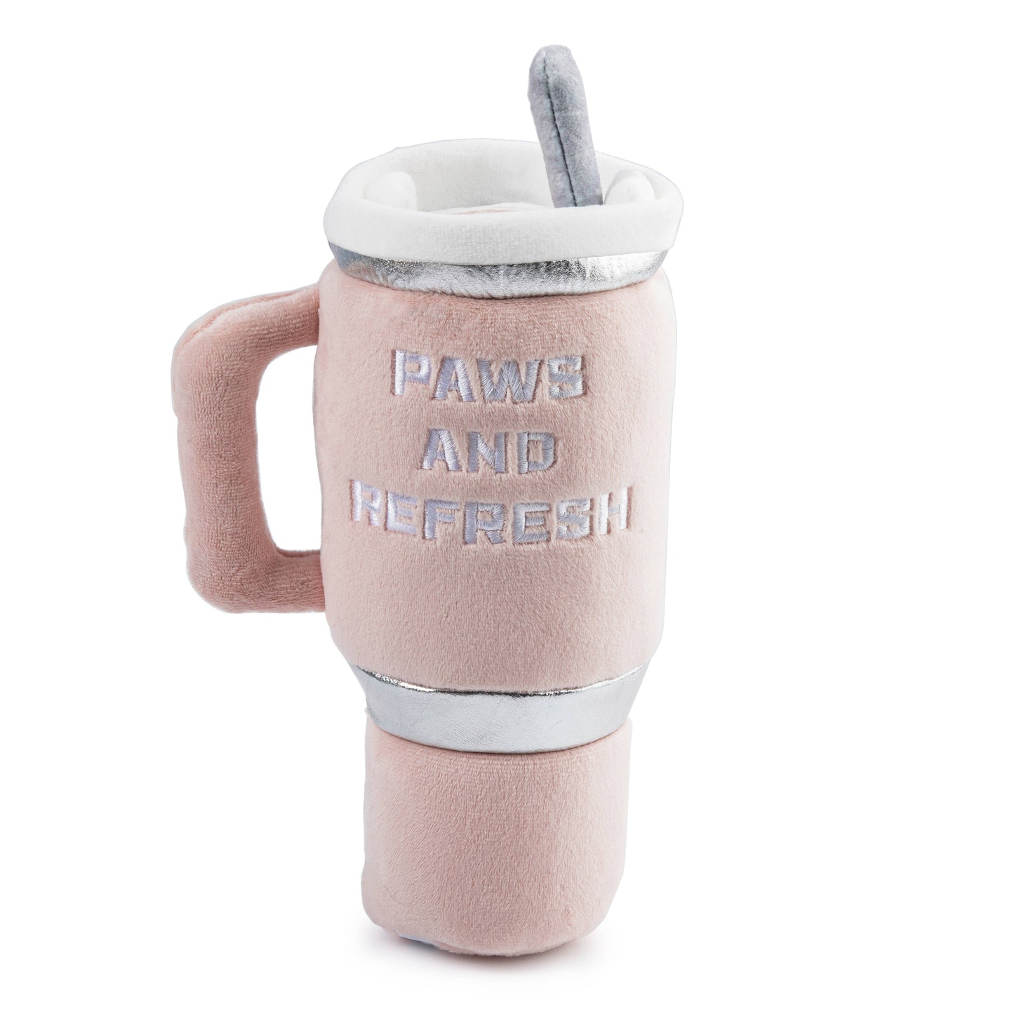 The Snuggly Cup - Blush by Haute Diggity Dog is a plush coffee cup toy with a handle and silver straw, perfect for canine play. It features PAWS AND REFRESH embroidery and charming silver accents on a light beige cup.