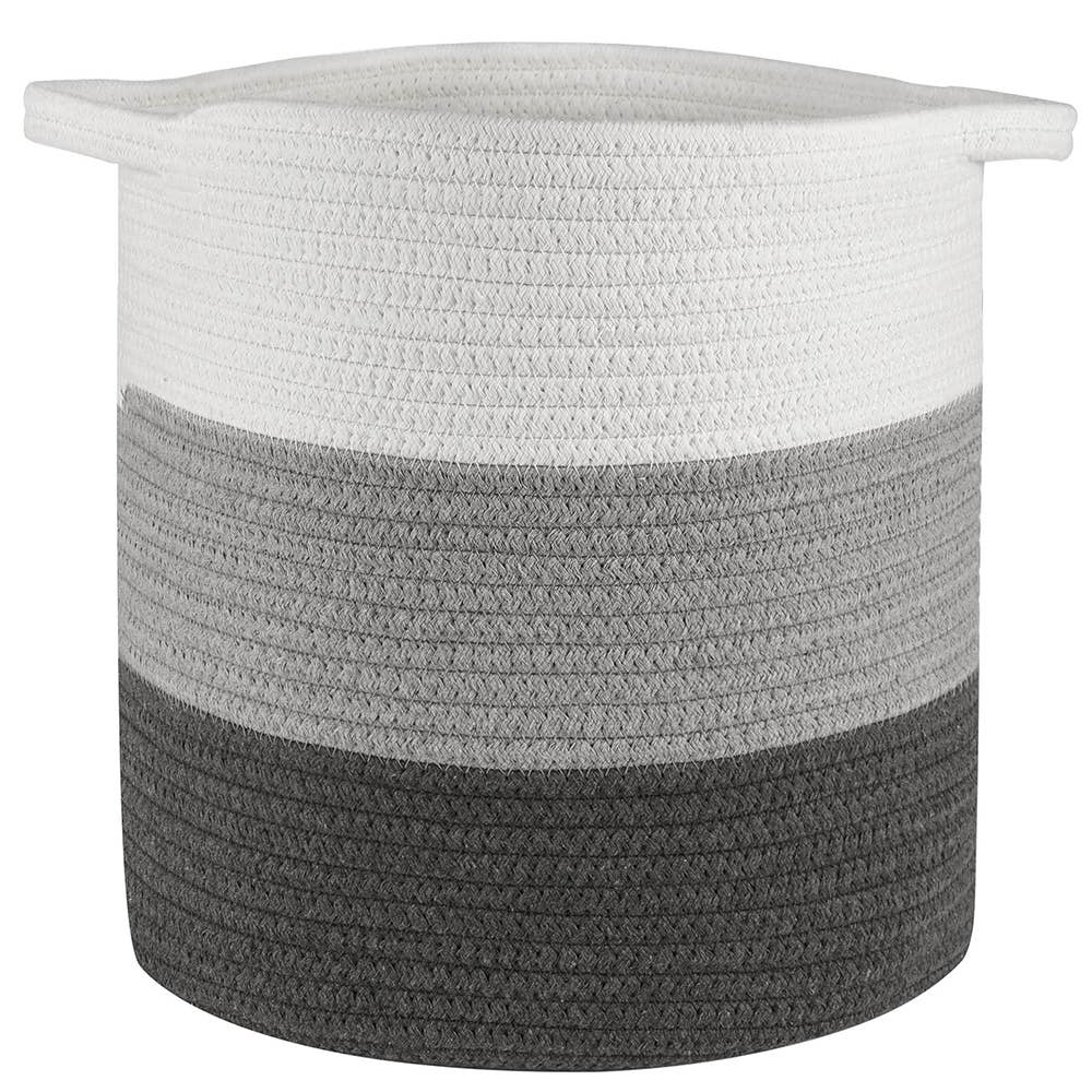 The Livra Pet Toy Basket by Park Life Designs is a round, woven storage basket made from natural organic cotton. It features horizontal stripes in white, light grey, and dark grey with two small handles for easy transport, making it perfect for household use or storing pet toys.