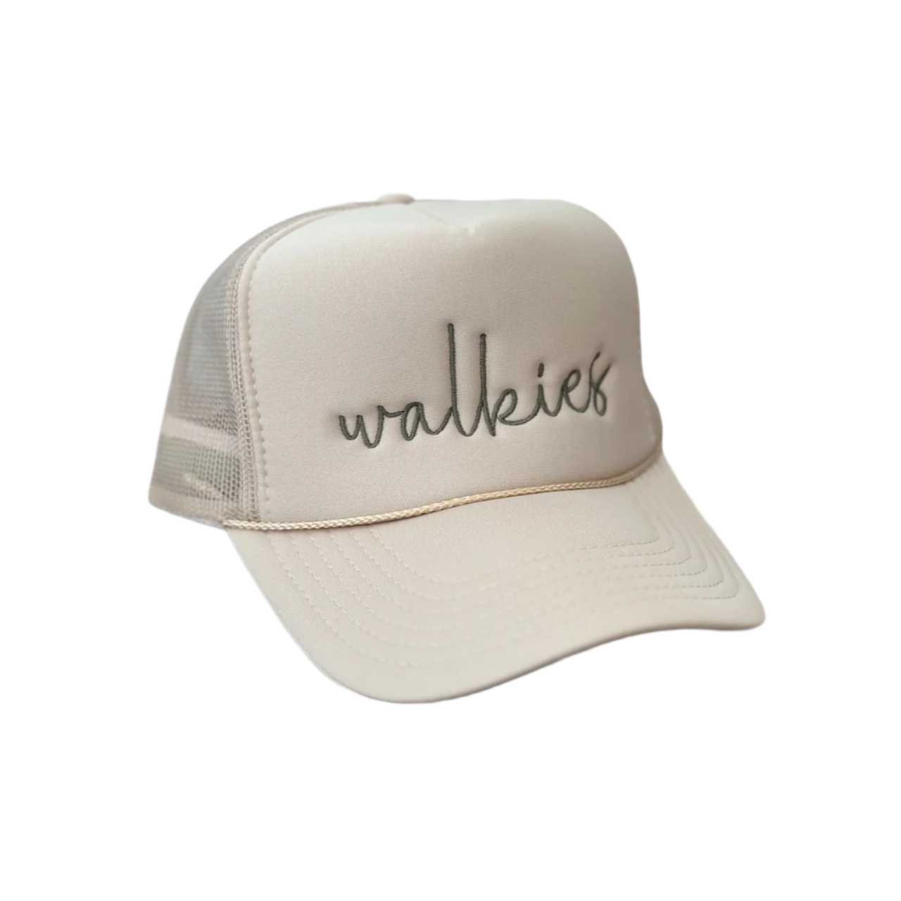 The Banks + Cove Walkies Trucker Hat is a beige hat with a mesh back, featuring walkies elegantly embroidered in cursive on the front, perfect for animal lovers. It is set against a neutral backdrop.