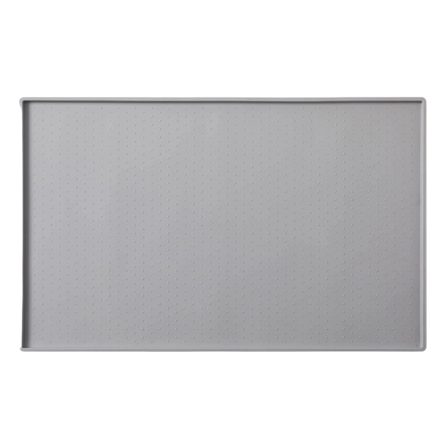 The Silicone Mess Free Pet Placemat by Park Life Designs is a rectangular, light gray tray with a slightly raised lip and subtle dotted texture. This non-slip, waterproof mat ensures stability and cleanliness for your pets feeding area.