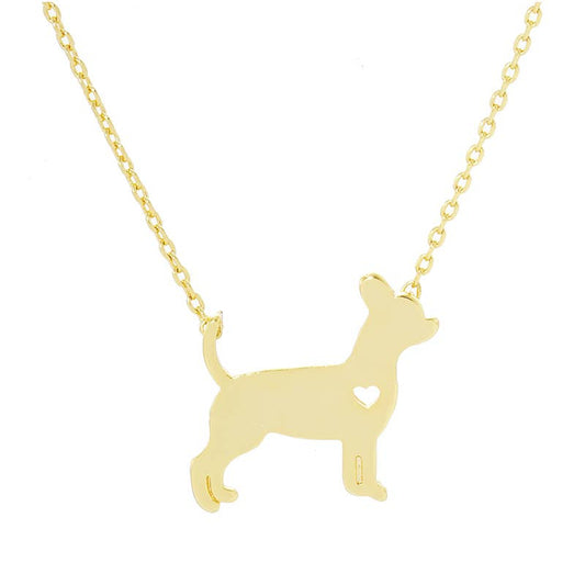 The Banks + Cove Chihuahua Love Necklace showcases a gold-tone pendant shaped like a small dog with a heart cut-out near its chest. The delicate chain complements the design, and the plain white background accentuates its elegance, making it a perfect piece of dog jewelry.
