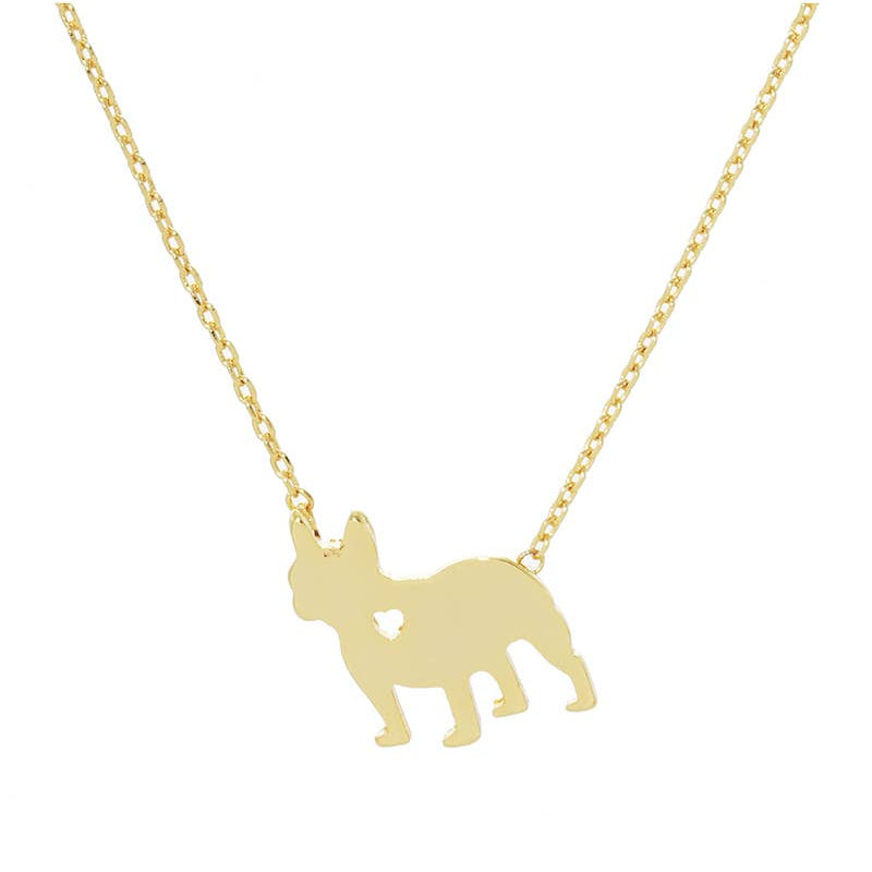 The Frenchie Love Necklace by Banks + Cove is a gold-tone piece ideal for any dog mom, featuring a bulldog silhouette pendant with a heart cutout on a delicate chain.